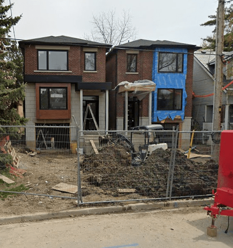 Two oversized homes. The result of lot severing.